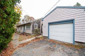 Solid constructed 3 bedroom, 1 bathroom Ranch featuring an attached one car garage, situated on a spacious lot exceeding half an acre in the sought after Pawcatuck location !