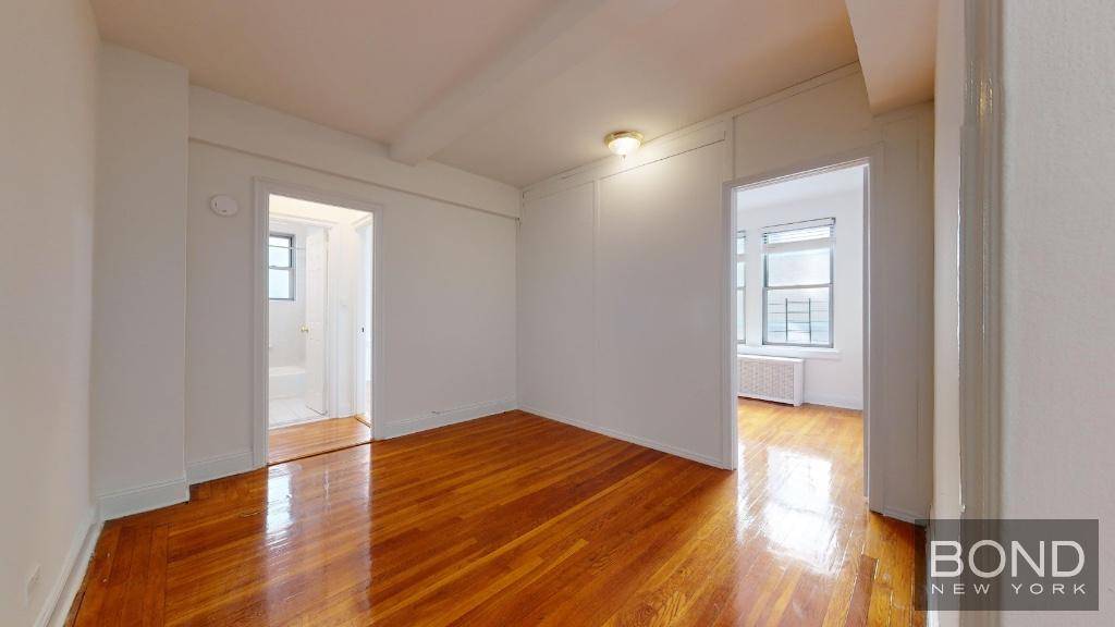 Beautiful 1 bedroom convertible 2 with high ceilings, hardwood floors, generous room sizes, a separate kitchen with stainless steel appliances and a dishwasher, good closet space and high ceilings.