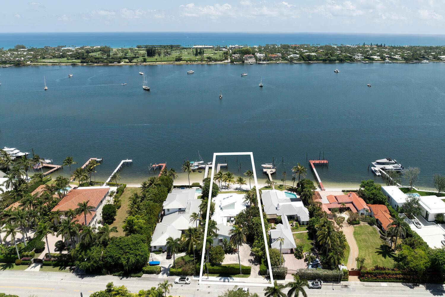 Fabulous Key West Style 5 Bedroom, 4 Bath Direct Intracoastal Pool Home with Amazing Intracoastal Views, a Wonderful Sandy Beach, Ocean Access, and Dock with a Sea Wall situated on ...