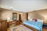 Bedroom with hardwood / wood-style flooring and recessed lighting