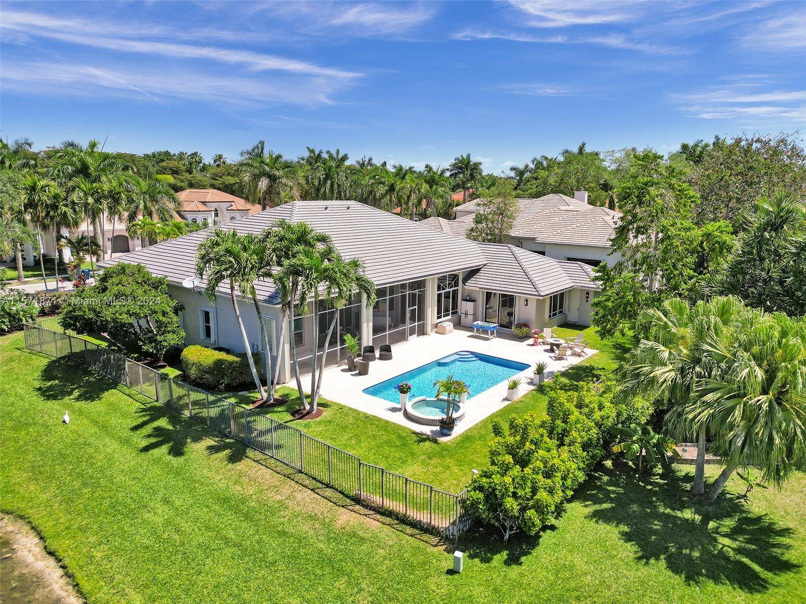 Discover this luxurious, FULLY upgraded waterfront home in Provence at Weston Hills.