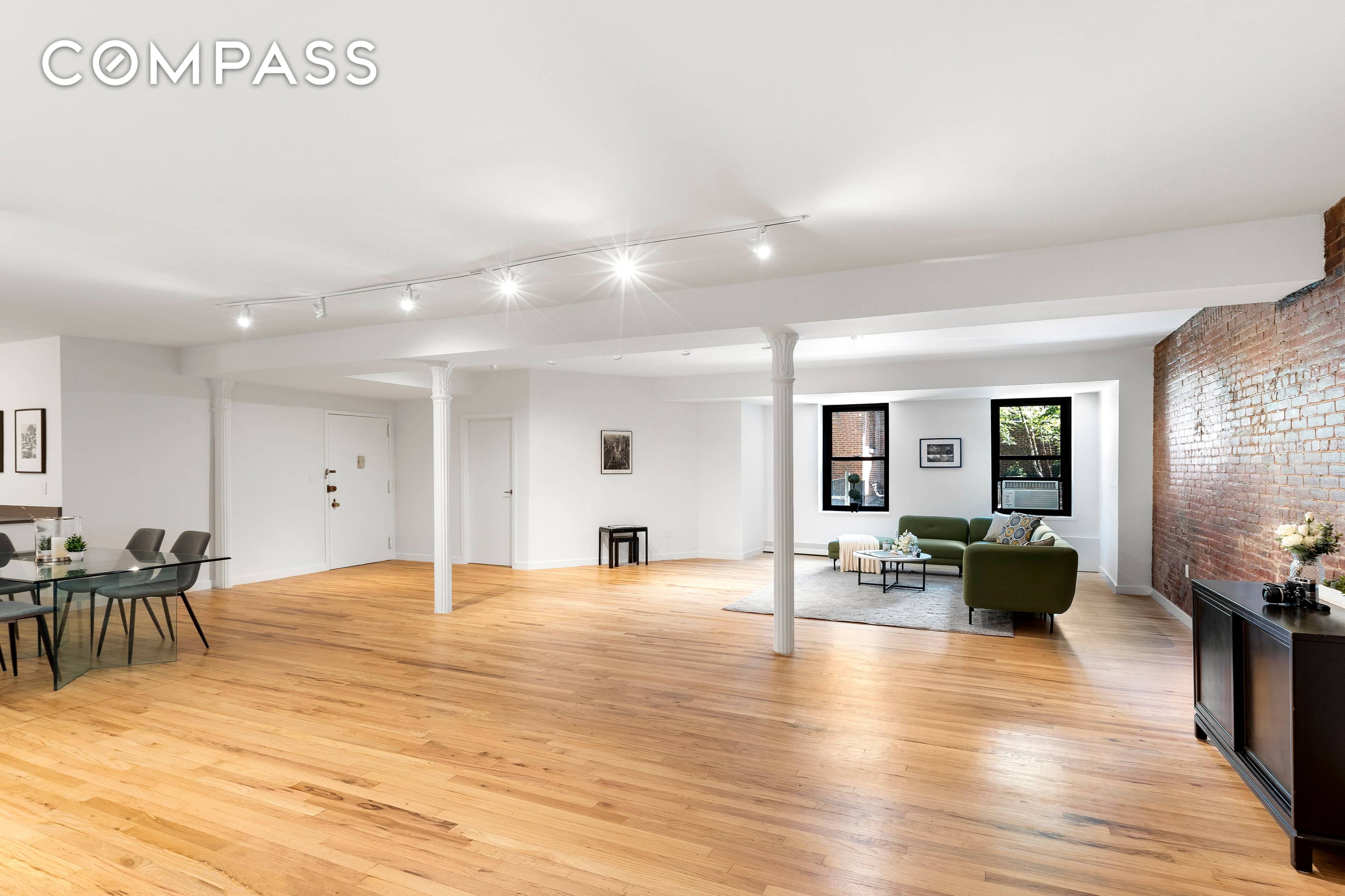 Spacious renovated celebrity loft overlooking the landscaped courtyard at the historic Piano Factory in Hell s Kitchen, the Downtown alternative.