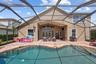 Pool and spa area with covered outdoor entertaining space.