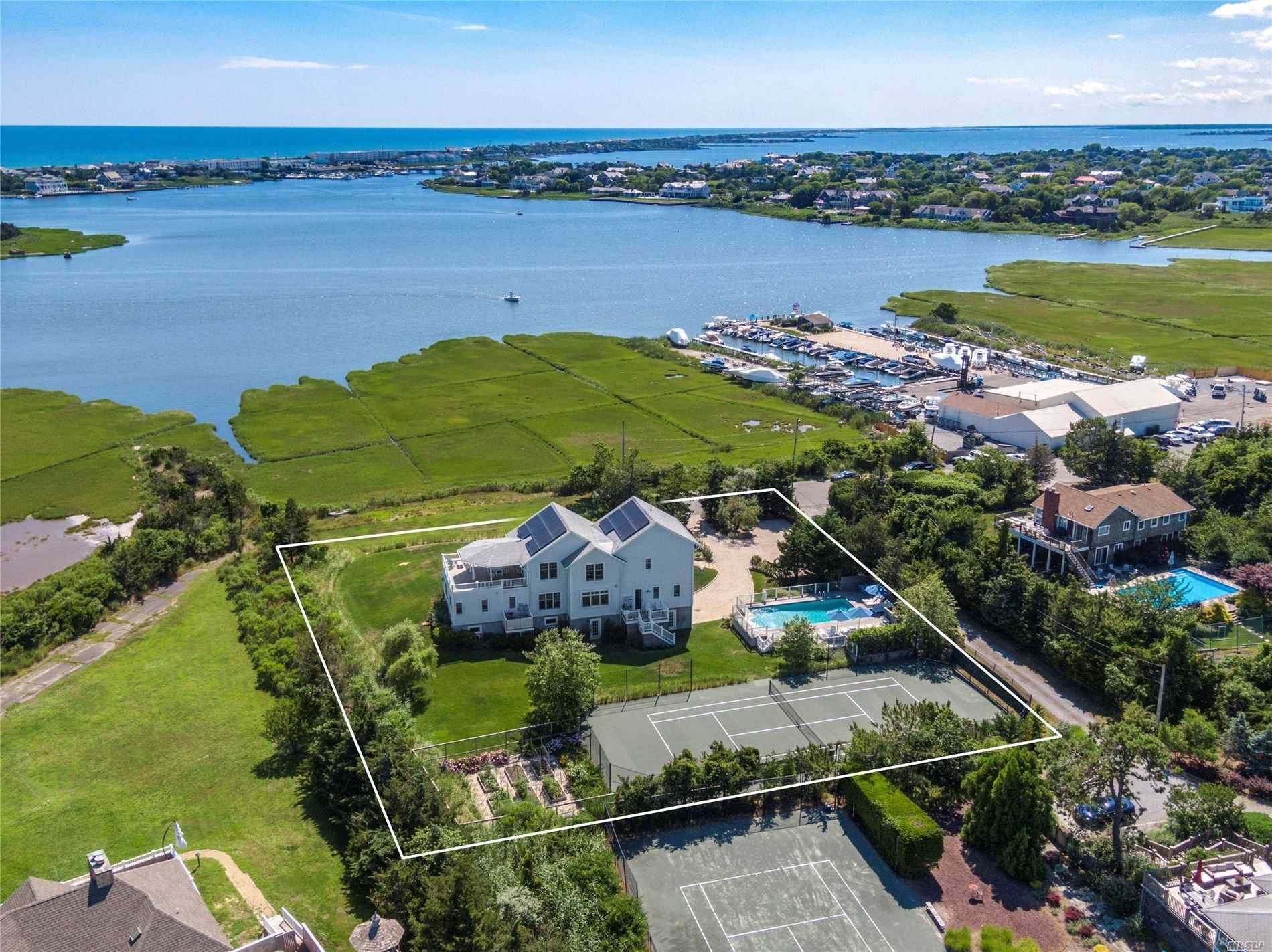 A rare opportunity to own a turn key waterfront home less than half a mile from both the Village and the beach, and surrounded by protected wetlands for unobstructed private ...