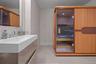 Bathroom with tile patterned flooring and vanity