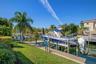 Backyard and 40-foot dock with boat lift