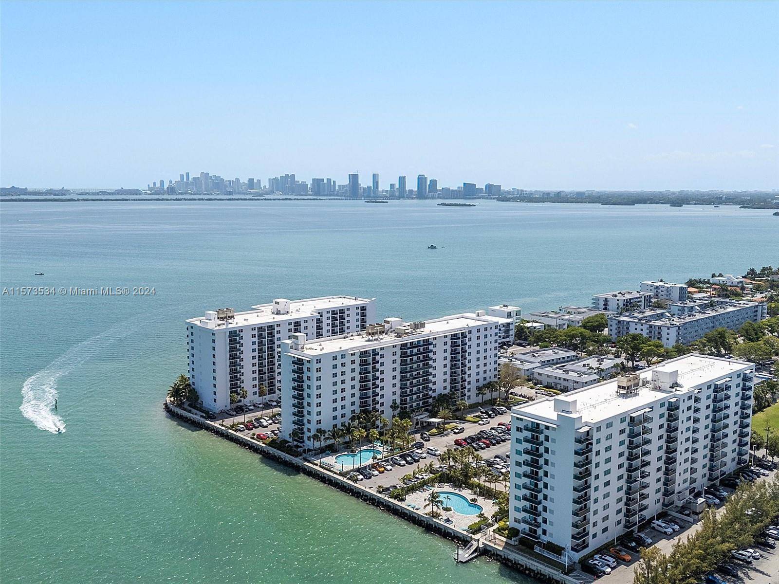 Discover luxury and tranquility in this stunning condo at Treasures on the Bay II.