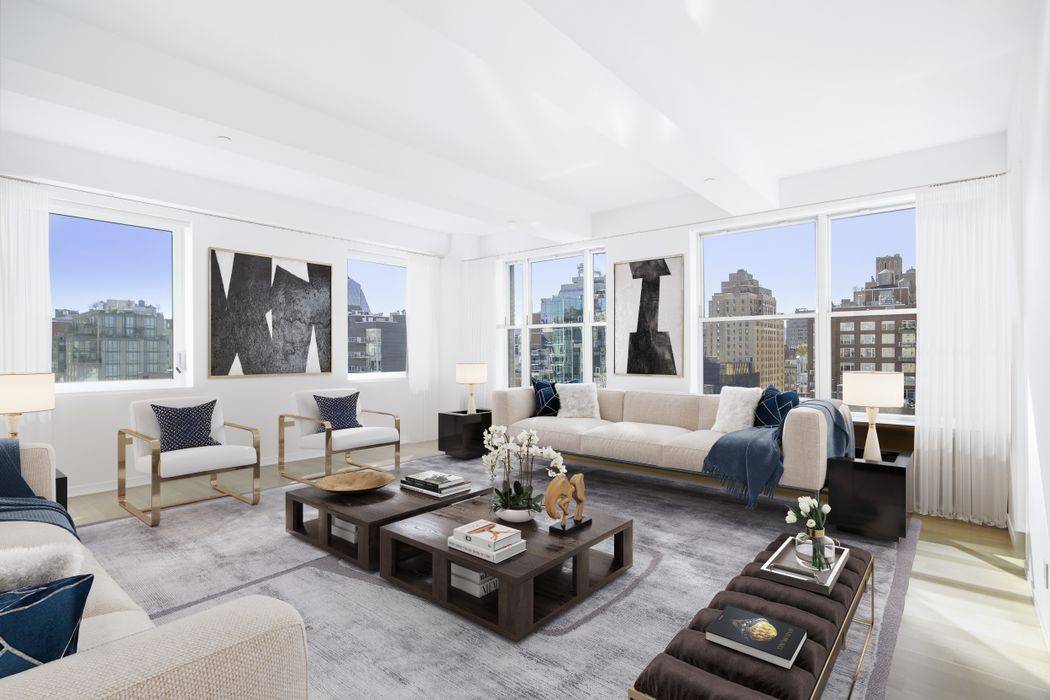 Perched high above Chelsea, this mint, recently renovated, masterfully designed full floor loft offers stunning skyline views in every direction !