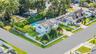 Aerial view of residential area featuring a pool