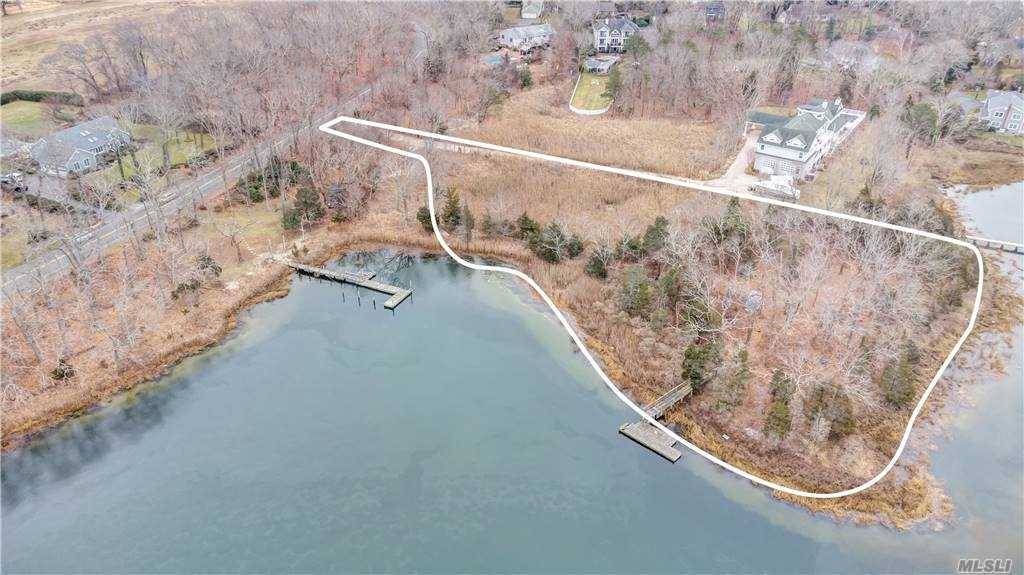 This waterfront property has an existing dock on Reeves Creek.