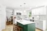 fun blue island pops against white cabinetry!