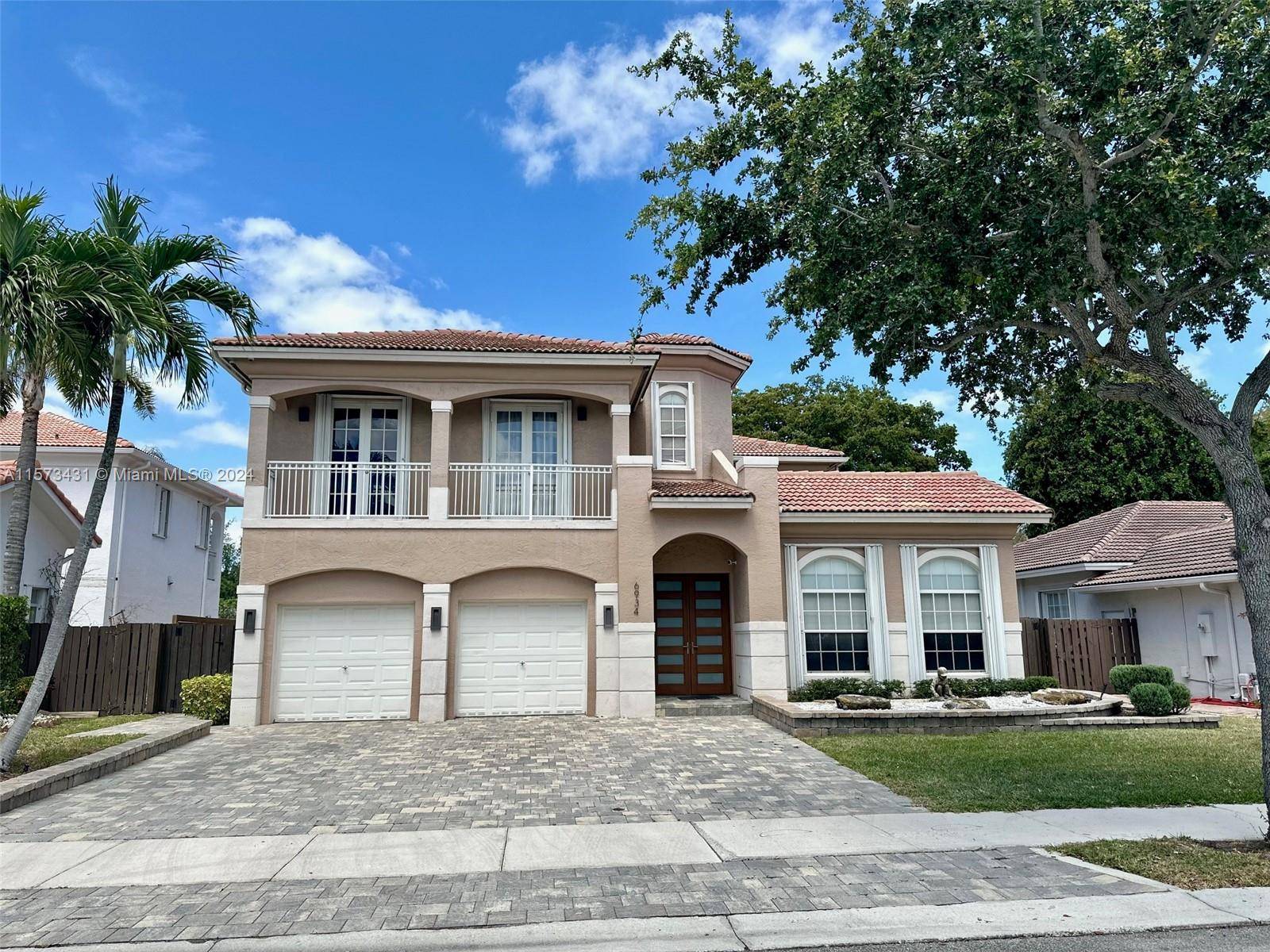 Introducing a beautiful two story single family home located in a prestigious area at Doral, recently renovated with state of the art appliances, high end finishes and seamless blend of ...