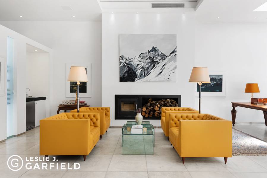 Behind the doors of one of New York's historic carriage houses is a magnificent single family residence outfitted with luxurious amenities that rival the City's newest developments such as a ...