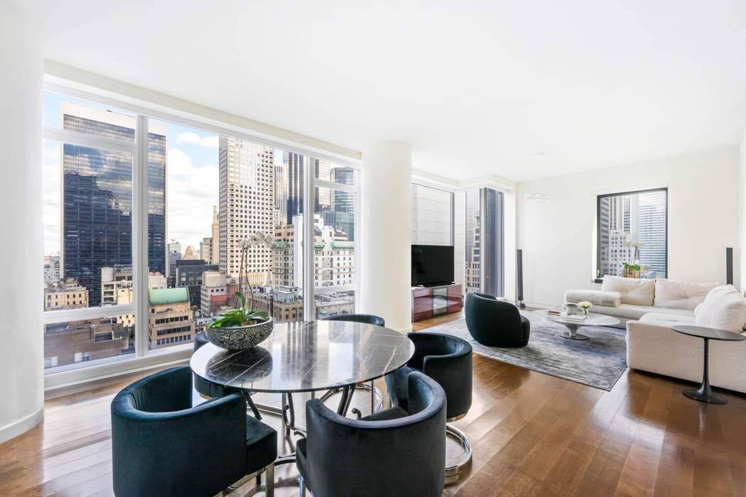 Exceptional design and refined elegance define this warm 22nd floor, 2 bedroom, 2.