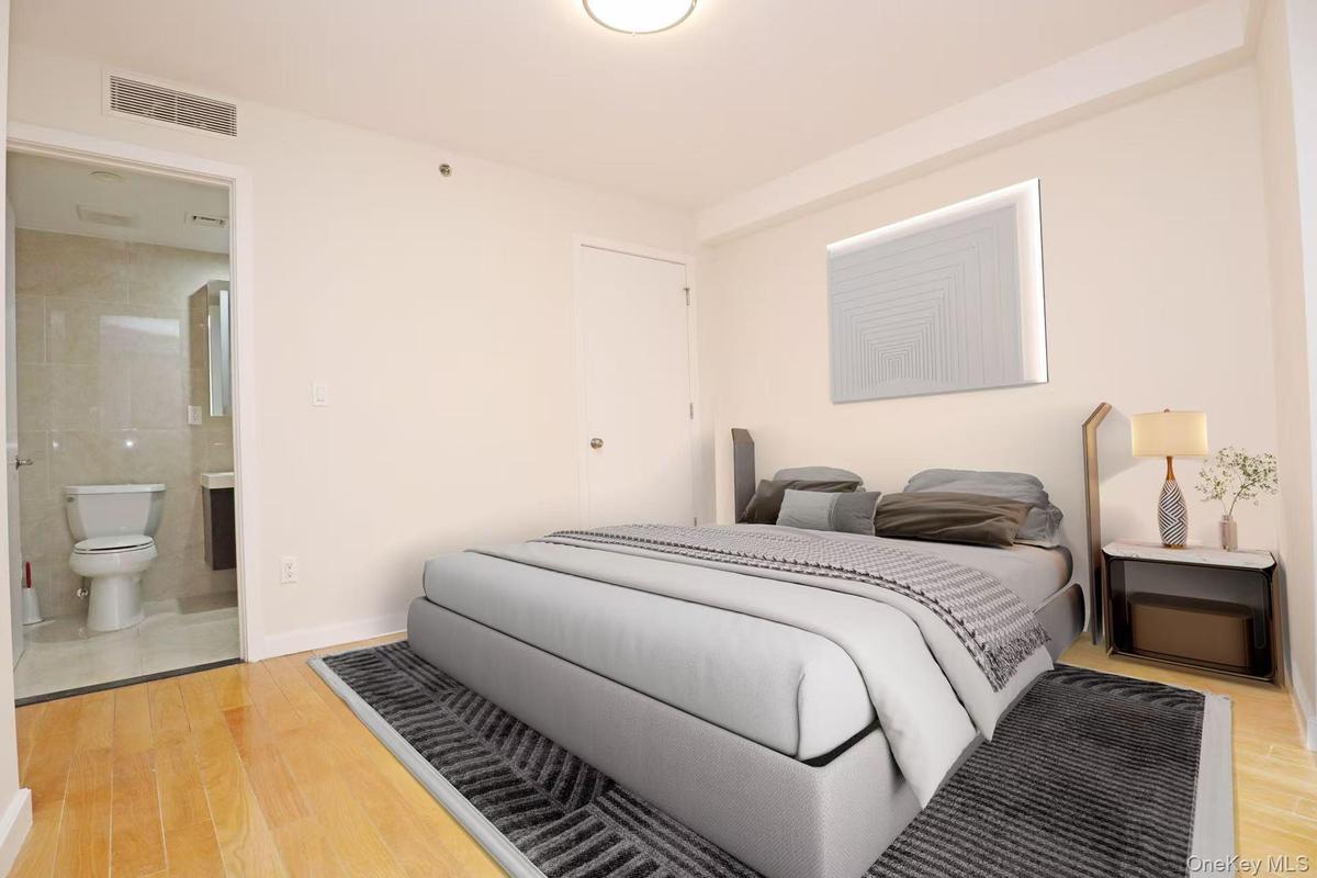 Bedroom with light wood finished floors