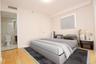 Bedroom with light wood finished floors