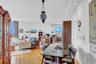 Dining area with recessed lighting, light wood-style floors, and baseboards