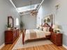 Virtually staged Barndominium bedroom +1 bath