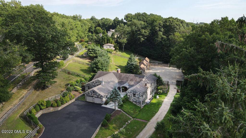 a spacious fully updated 5 bedroom home on 4 acres all surrounded by 686 acre Audubon conservation property just 35 miles from NYC !