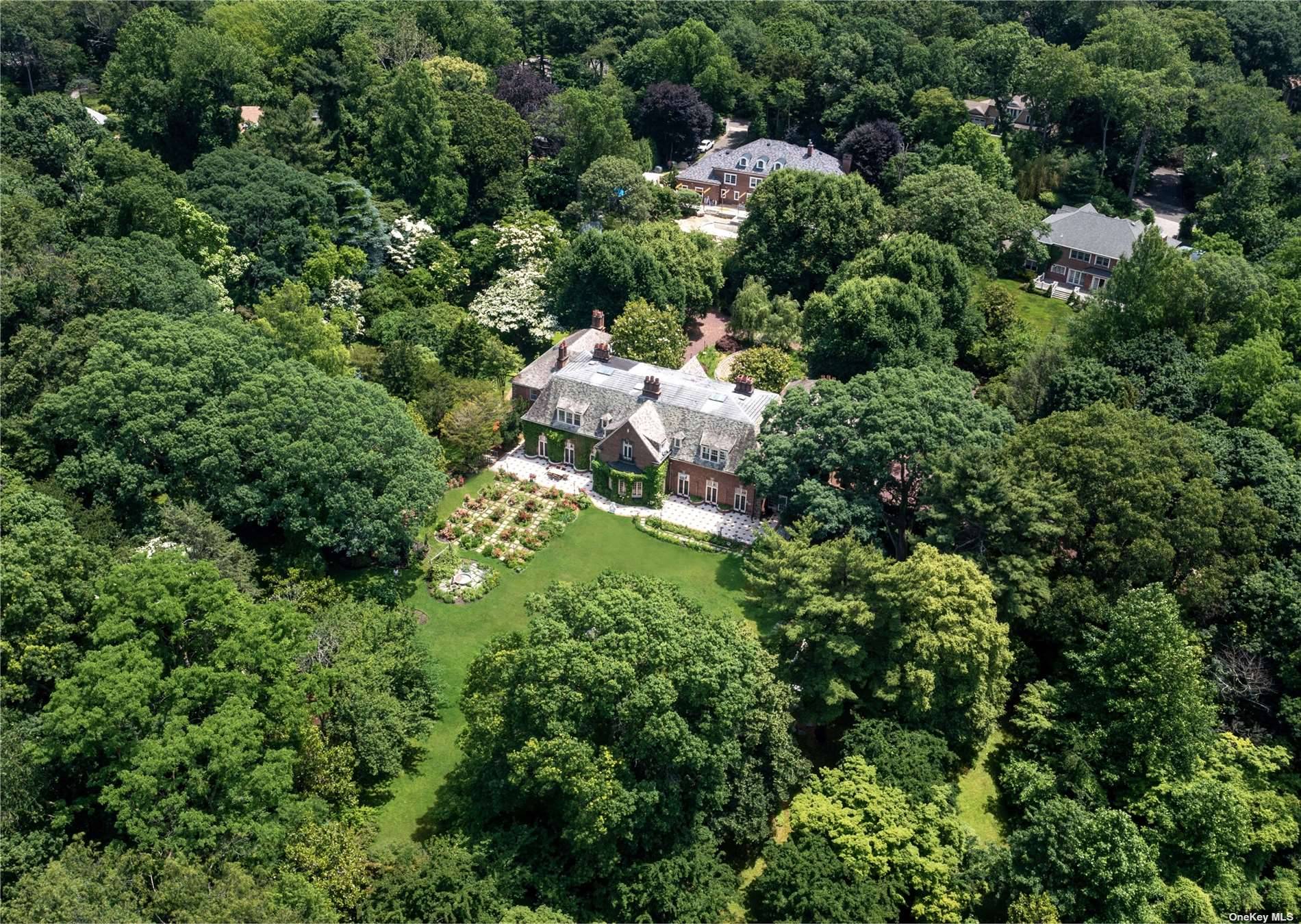 The Rivington House, an all brick restored roaring 20's estate situated on 3.