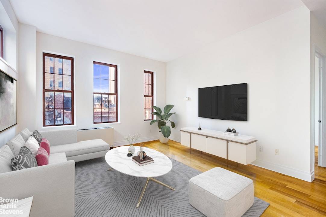 MOTIVATED SELLERThis loft like one bedroom with walls of windows on two sides is located in a pre war boutique condominium building in the heart of the Financial district.