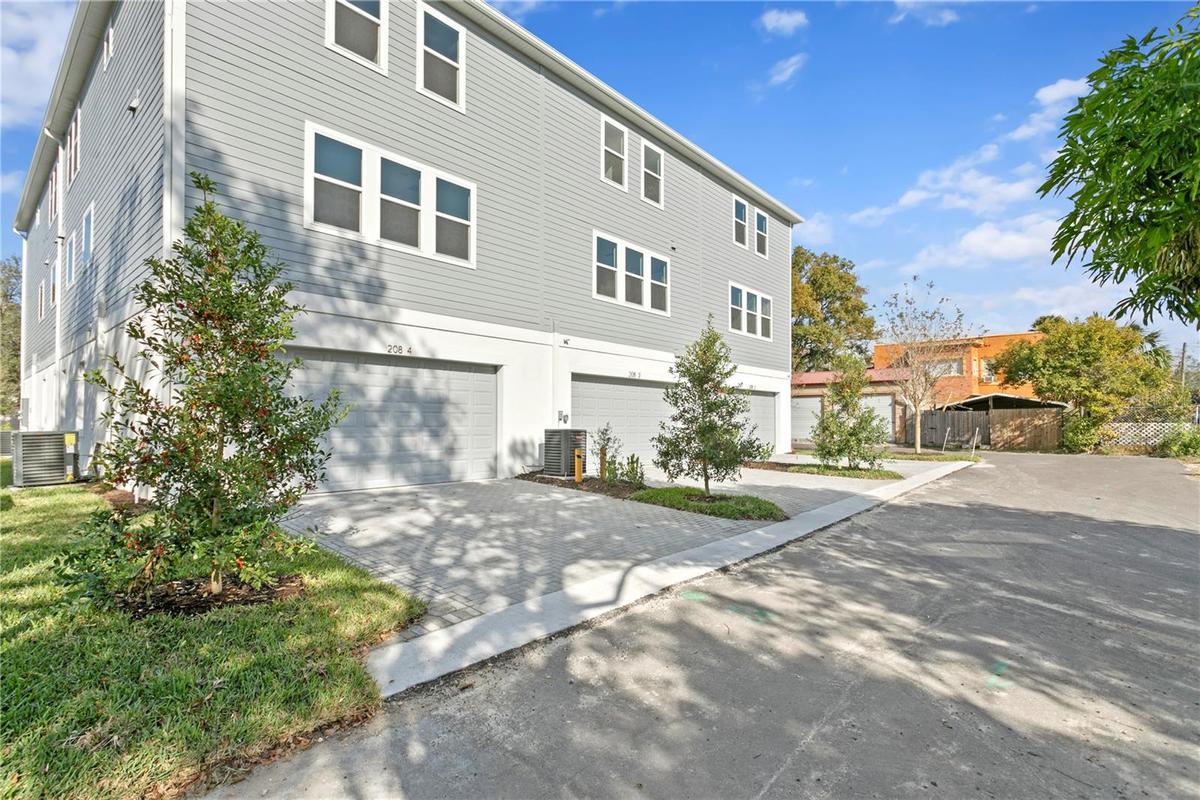 Garage entry in rear plus driveway for 2 cars