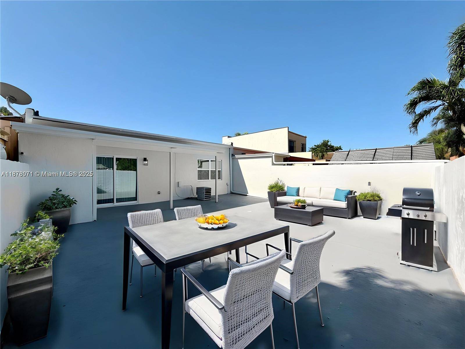 Welcome to this beautifully updated 2 bedroom, 2 bathroom VILLA no stairs to climb featuring a NEW ROOF and FULL IMPACT WINDOWS for peace of mind and energy efficiency.