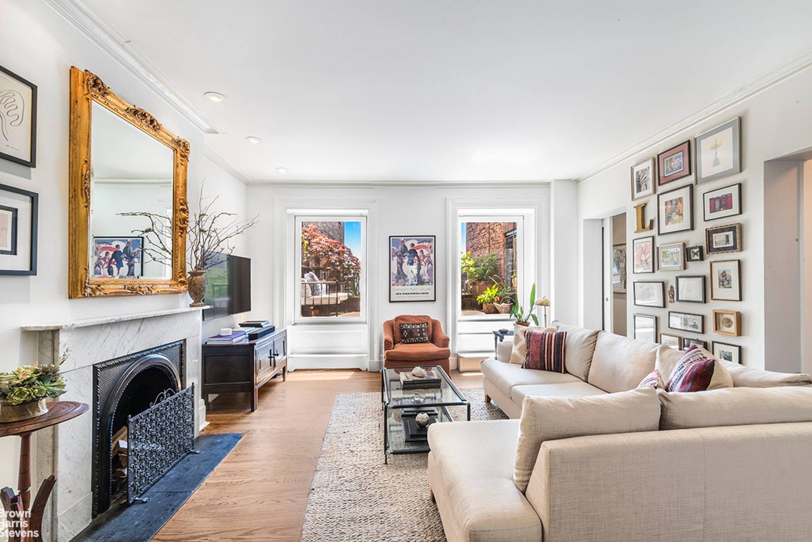 By Appointment Only Rarely available 2 bedroom 2 bath floor through home with private terrace in a turn of the century Brooklyn Heights five unit elevator brownstone.