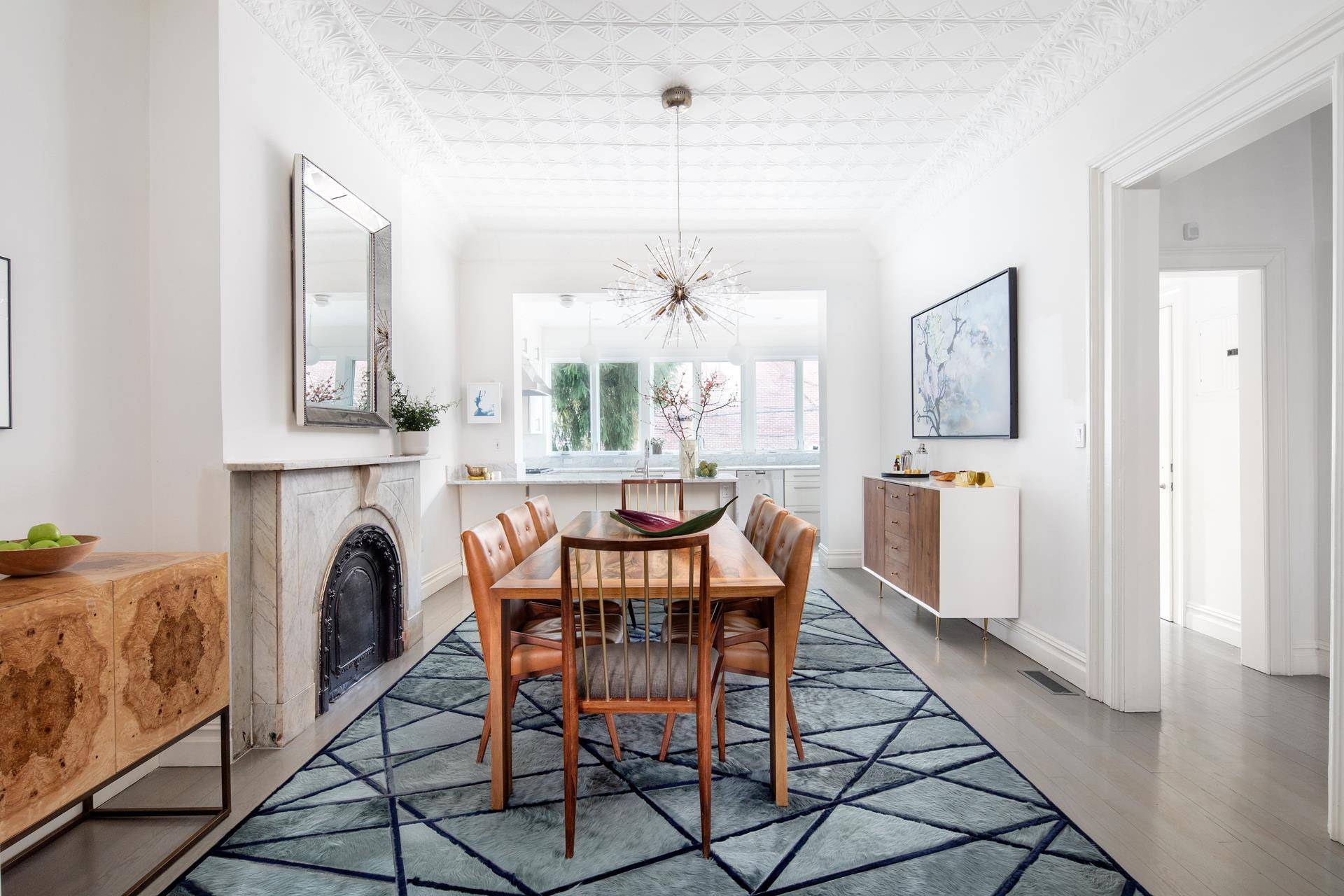 Brooklyn's past and present meet in this truly remarkable six bedroom, four and a half bathroom Carroll Gardens townhouse, flanked by Court and Smith Streets.