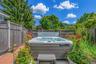 outdoor Spa seats 5 located near outdoor show and pool