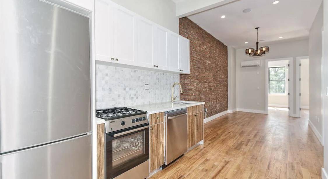 Super Spacious Nicely Renovated 3 Bed 2 Bath with Condo FinishesNew Kitchen with Stainless Steel Appliances and a DishwasherCentral Heat and ACShared Garden, Roof Deck, Gym and Laundry RoomHardwood Flooring ...