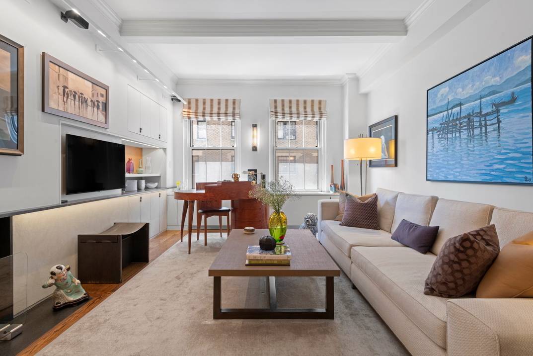 Graced with chic finishes and illuminating southern light, this pristine corner 2 bedroom, 2 bathroom co op is a portrait of modern Upper West Side elegance and charm.