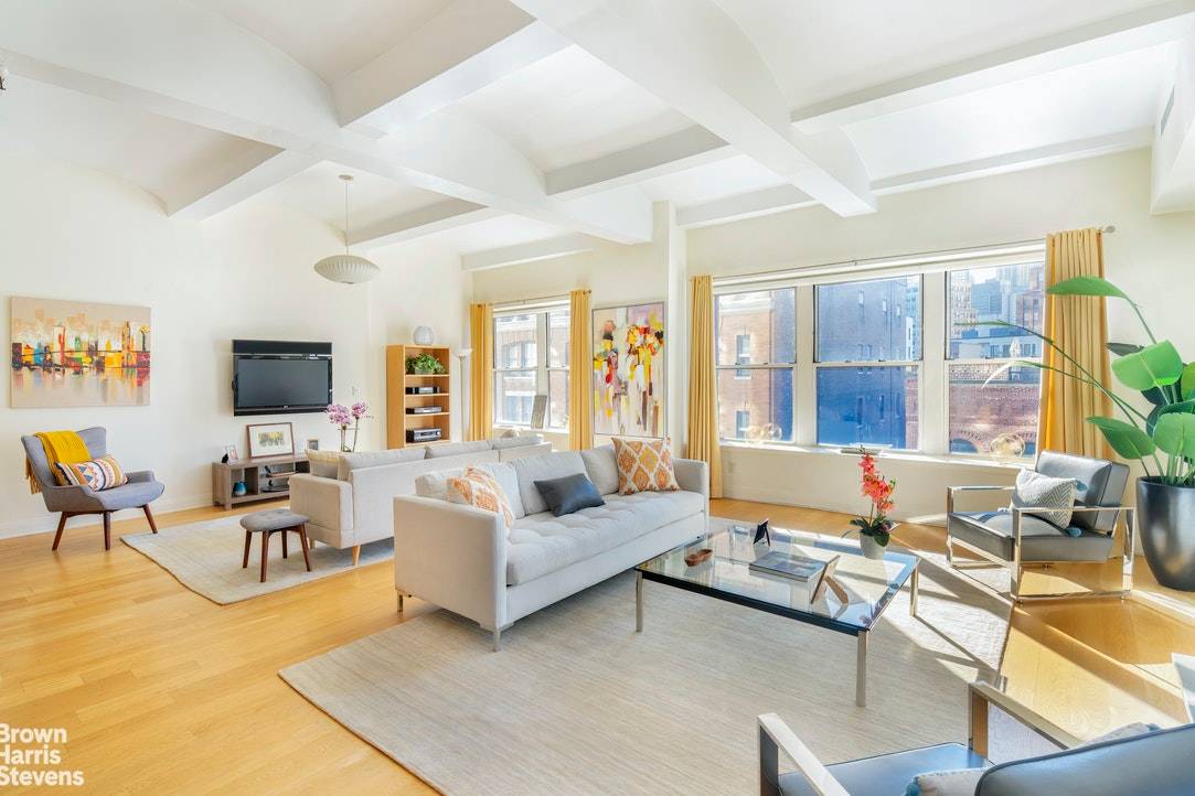 Sun flooded and stunning, this two bedroom convertible three bedroom, two bathroom condominium has a fabulous floor plan and is on arguably one of the best blocks in Tribeca.