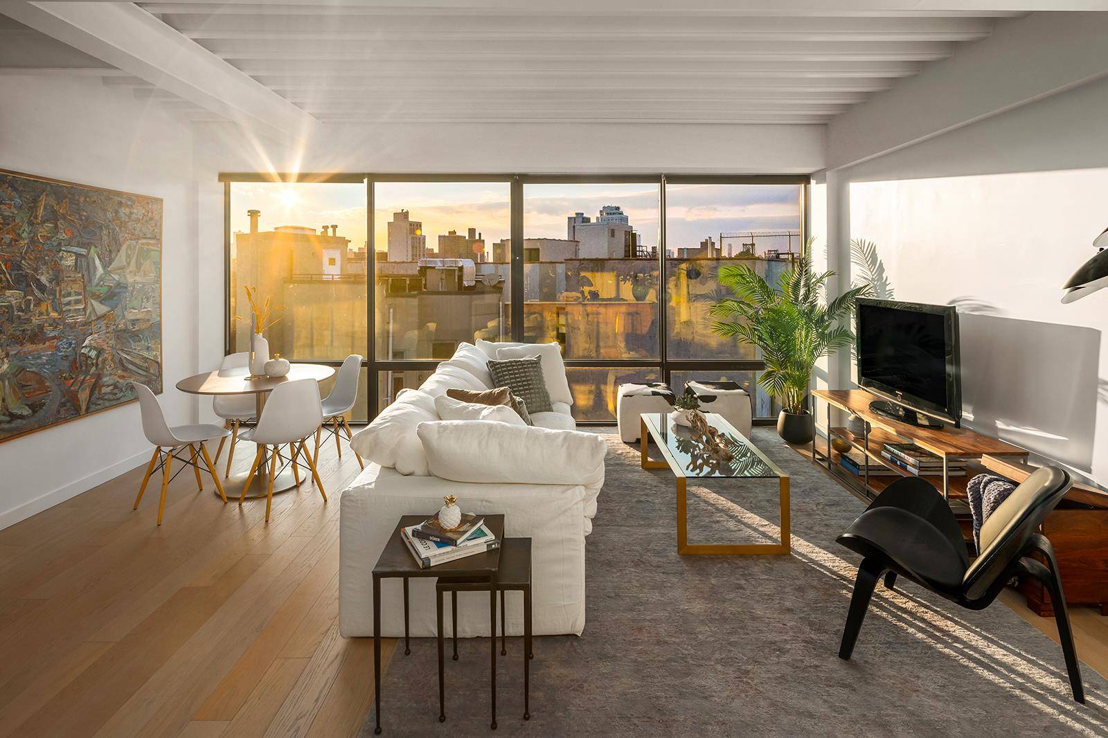 Prime Williamsburg penthouse with a huge private roof deck, private terrace, and sweeping views in a 19 residence building with amenities.