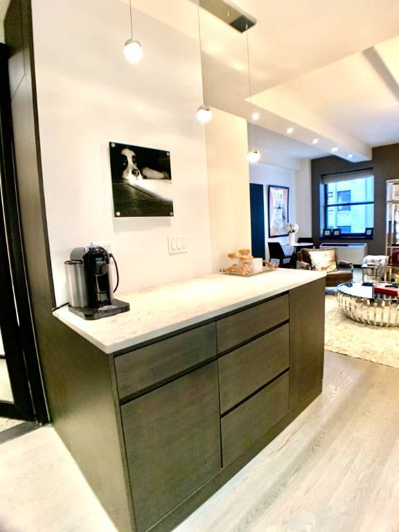 Located at one of the Financial districts most desirable addresses, this expansive studio truly stands out from the rest with customizations throughout.