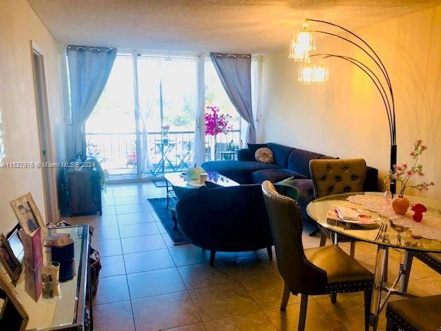 Beautiful corner 2bed 2bath condo unit w new kitchen appliances, lots of closet space, tile throughout, HURRICANE IMPACT WINDOWS, full balcony and unobstructed garden city views !
