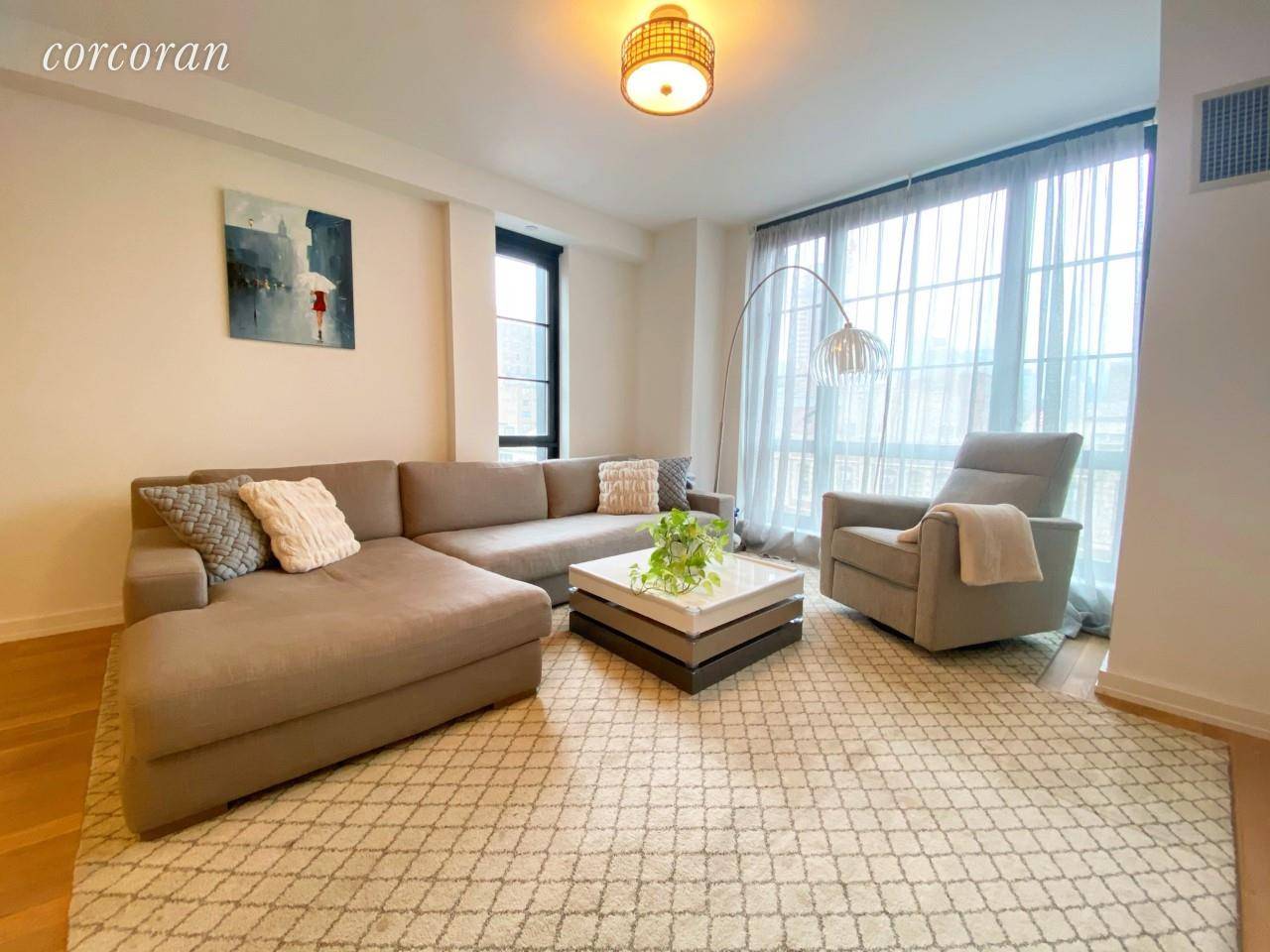 This beautiful three bedroom, two and a half bathroom home, in a newly constructed luxury condo, offers panoramic floor to ceiling, industrial style, square casement windows framing iconic, sweeping Manhattan ...