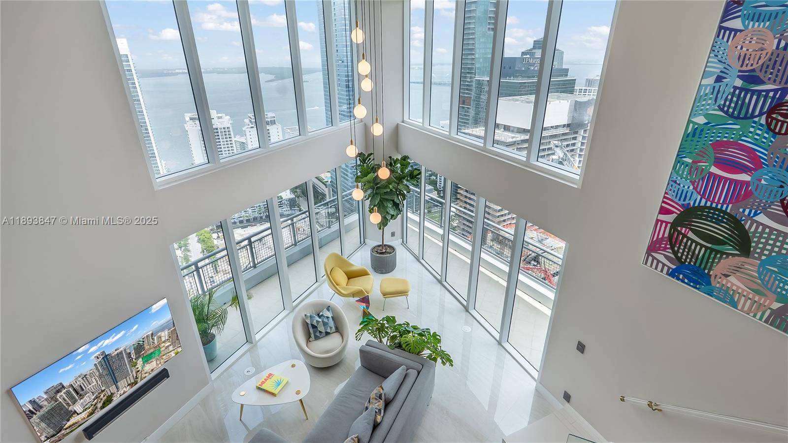 Experience sky high living in this exquisitely remodeled 2 story duplex soaring above Brickell on the 42nd floor.