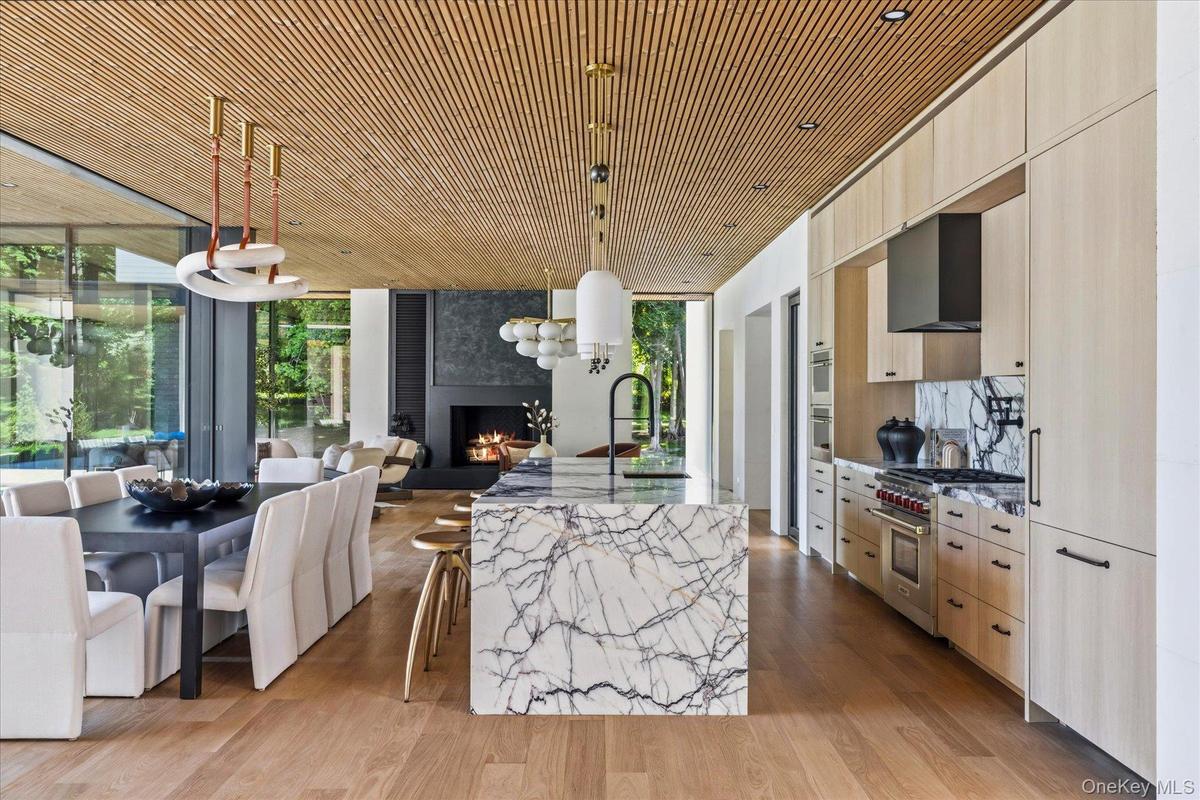 Kitchen with Wolf appliances, Luna wood ceiling and 7” white oak flooring