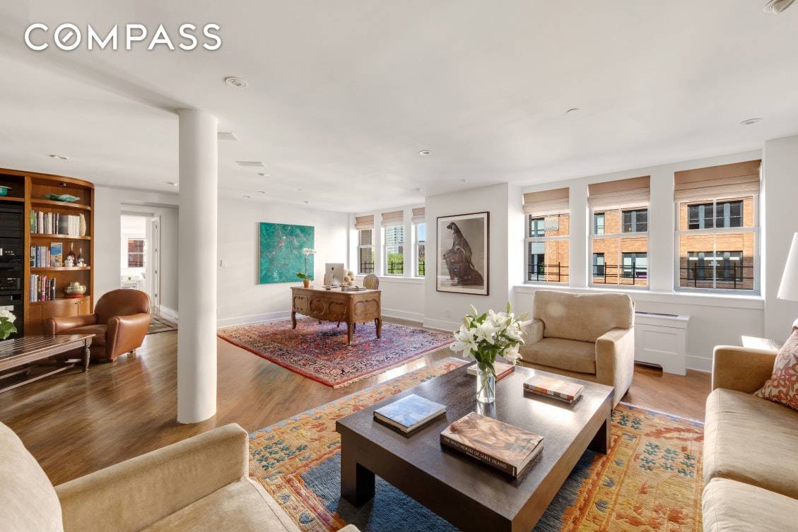 Located on the most desirable cobblestone block of Central Tribeca, this large 2, 436sf, 2 3 bedroom loft boasts lovely morning light that streams in through multiple over sized East ...