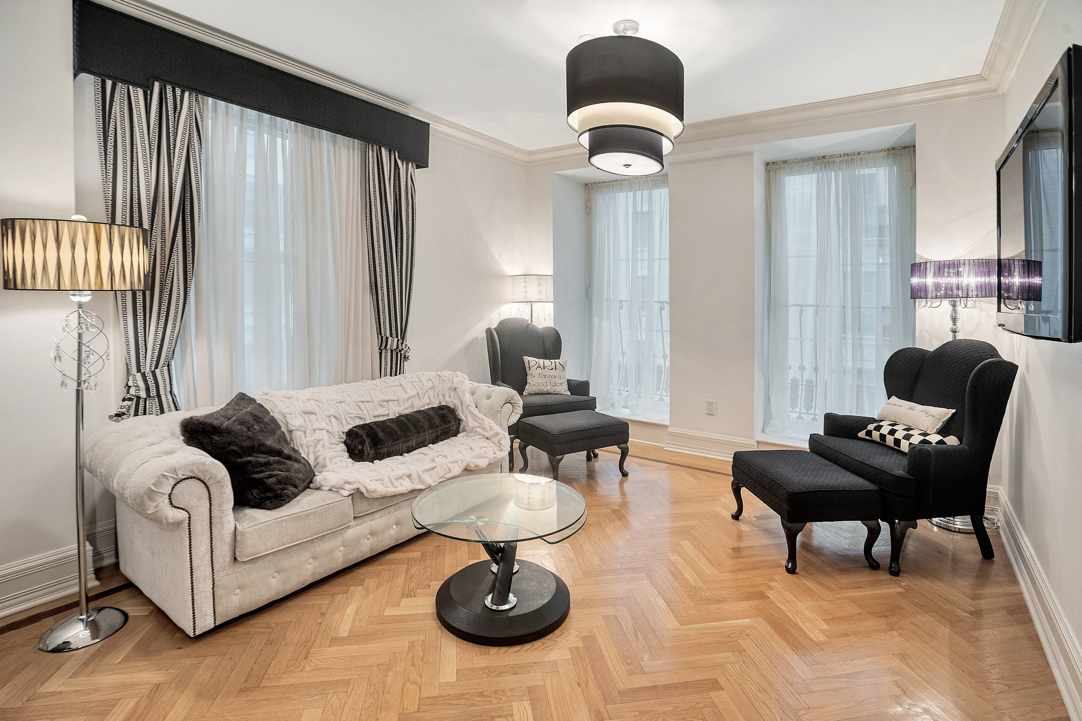 This spectacular South facing 1 Bedroom Home at the Plaza Private Residences offers large windows with floor to ceiling French doors and Juliette balcony overlooking the garden with a cascading ...