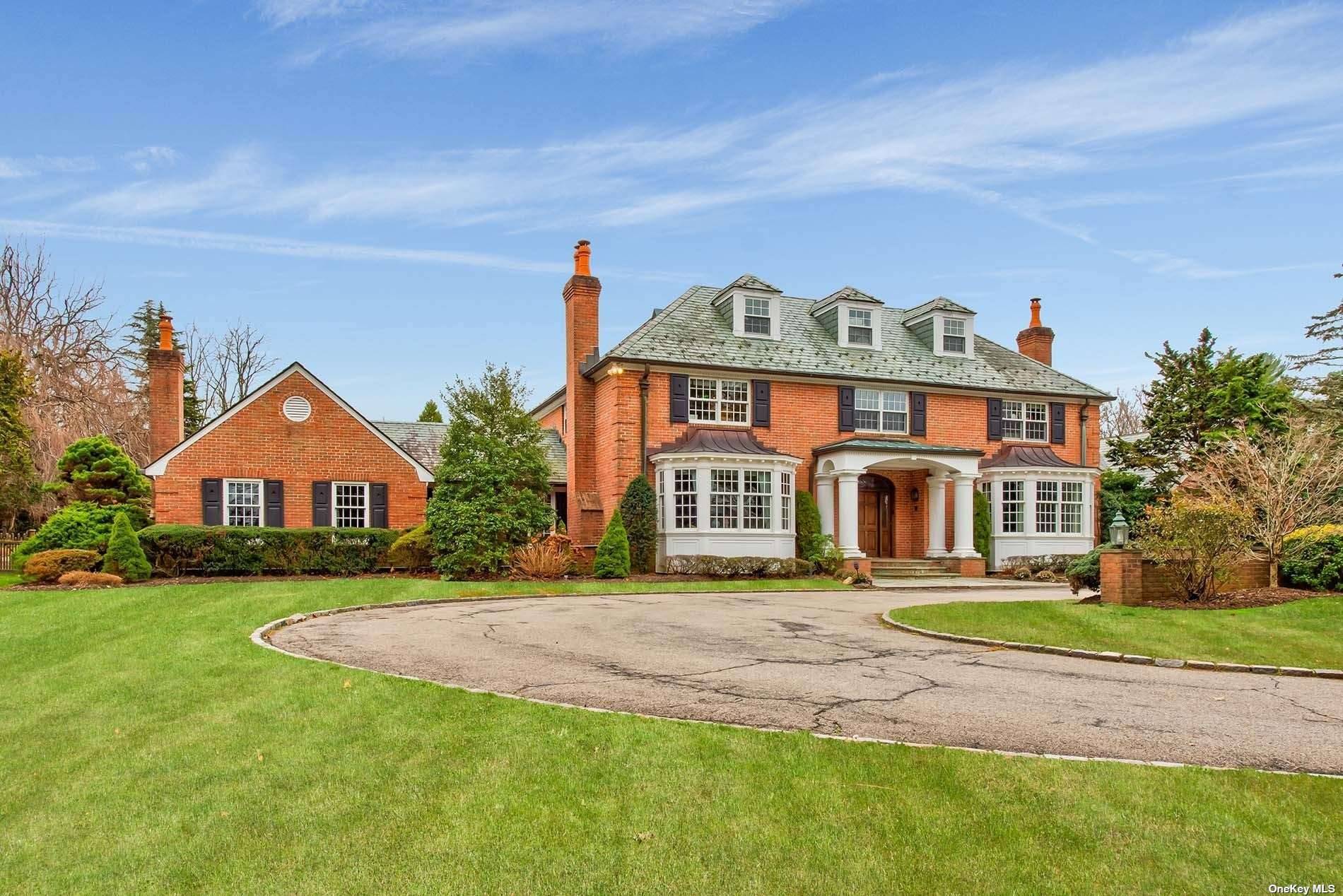 One of a kind classic brick Georgian Colonial with slate roof.