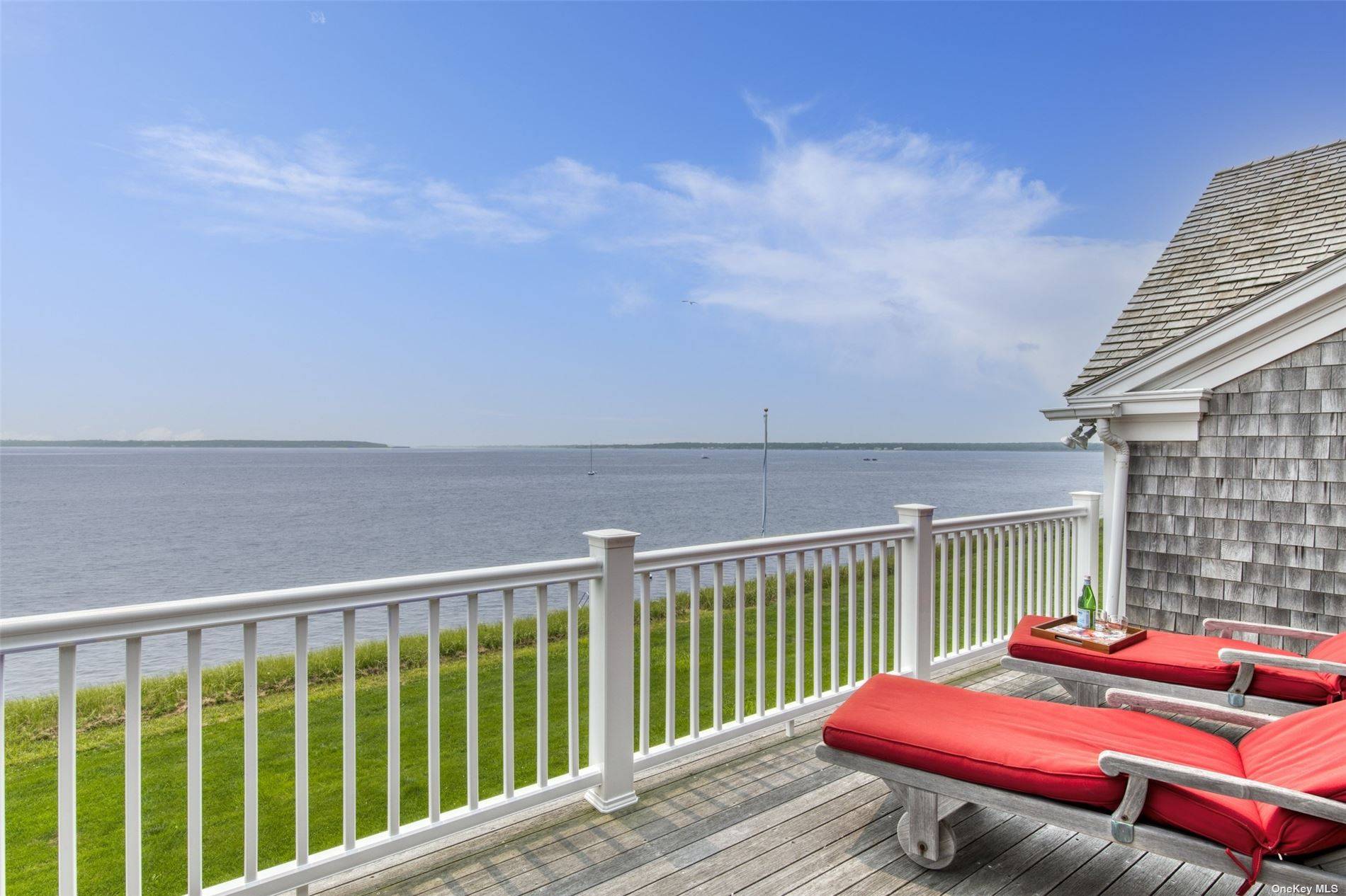 Enjoy a beautiful airy and bright mint condition Bay Front Orient Contemporary home, perfect for relaxing and entertaining.