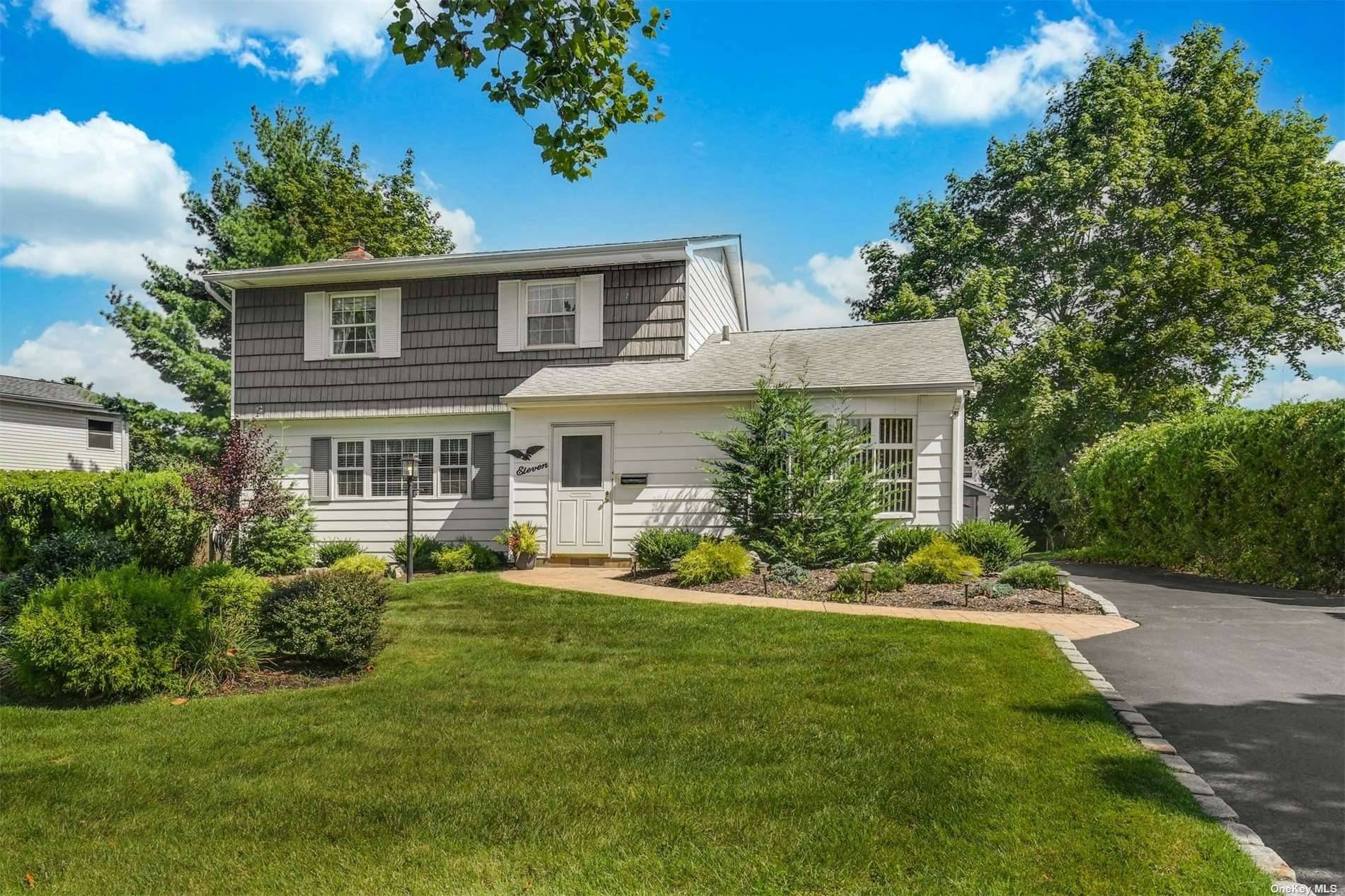 Lovely 4 Bedroom 1. 5 Bath colonial located on a quiet tree lined sidewalk street.
