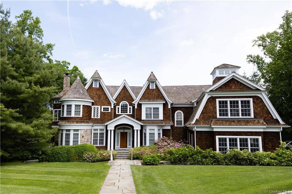 Welcome to an architectural masterpiece on coveted Algonquin Drive.