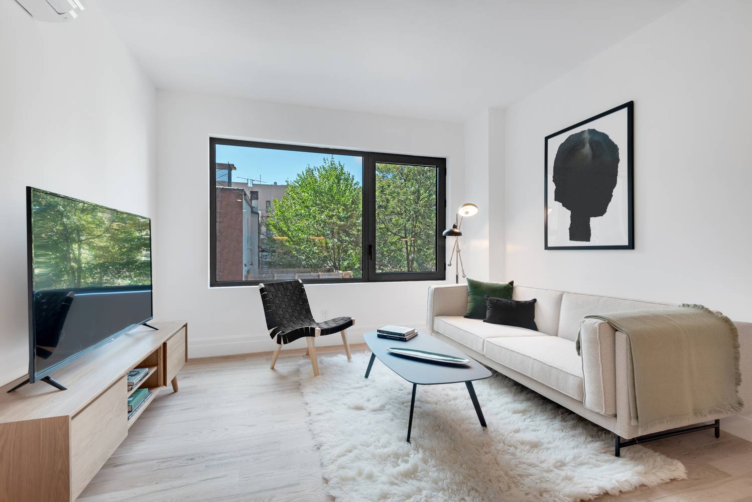 Located on a tree lined street among classic Brooklyn brownstones, this thoughtfully designed building is divided into three sections, each measuring the same width as the typical Brooklyn townhouse.