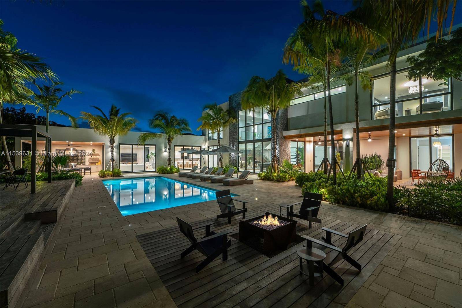 Tropical Modern Villa A masterpiece set on one of the most prestigious roads in Pinecrest.