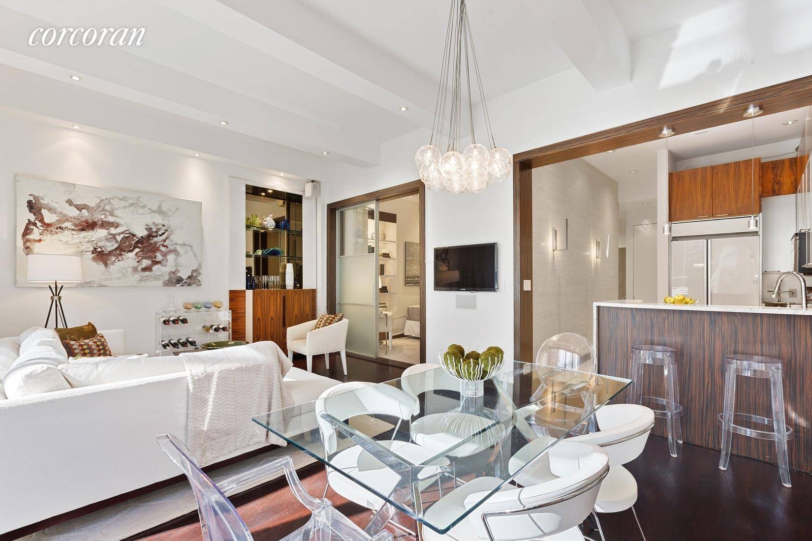 Apartment 4F is a sunny, beautifully designed prewar loft with 11 foot beamed ceilings and huge over sized windows.
