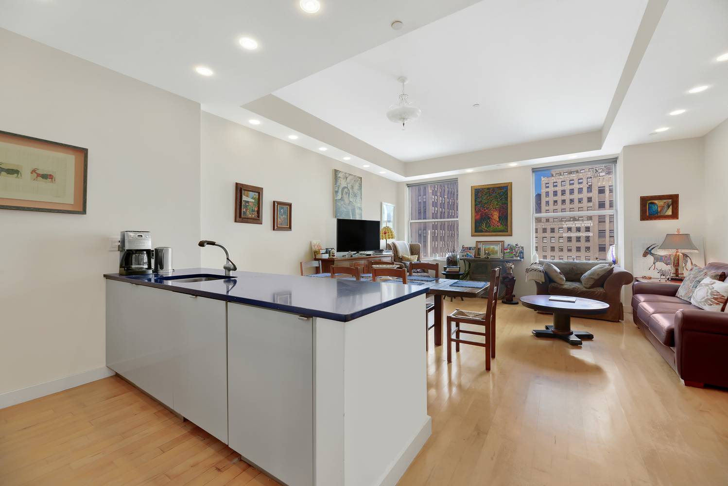 This spacious two bedroom two bathroom apartment at the glamorous Downtown by Phillipe Stark Condominium has unubstructed open views from all windows, 11 ceilings, elegant 4 wide maple floors, stainless ...