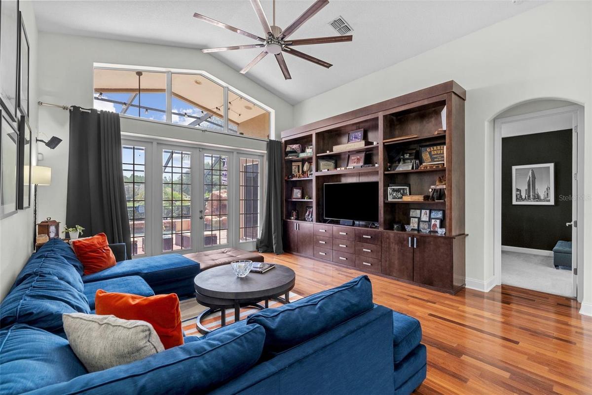Custom built-in entertainment center adds warmth and function.